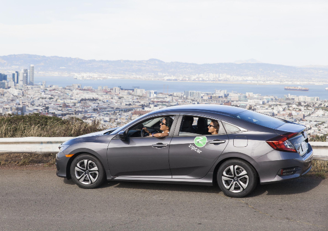 Woman driving Zipcar